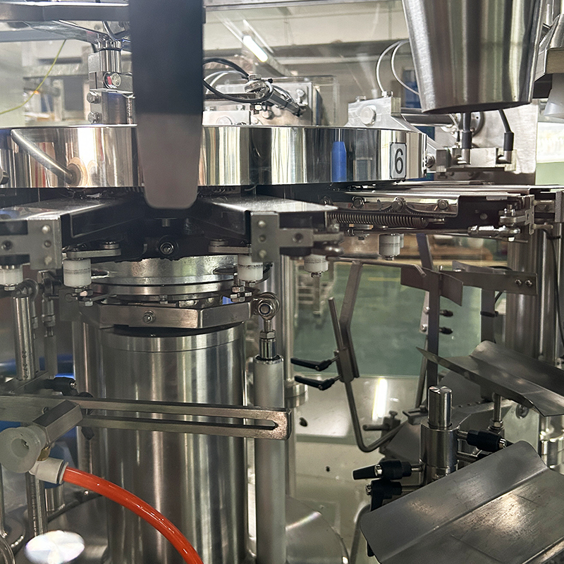 Automatische Viskose-Material-Schraube Mehrköpfige Waage Verpackungsmaschinen Gefrorene Trommelstangen Hühnernuggets Verpackungsmaschine